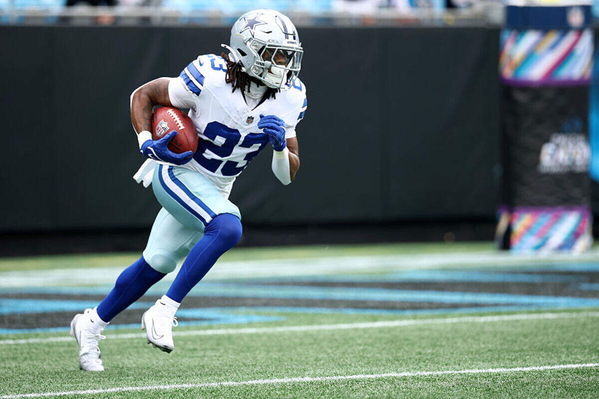CHARLOTTE, NORTH CAROLINA - OCTOBER 12: Jaydon Blue #23 of the Dallas Cowboys carries the ball following a kickoff during the NFL 2025 game against the Carolina Panthers at Bank of America Stadium on October 12, 2025 in Charlotte, North Carolina. (Photo by Jared C. Tilton/Getty Images)