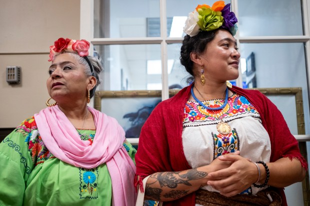 SAN ANTONIO, TEXAS - AUGUST 15: Julie Guerra and her daughter Nina Guerra attend a Guinness World Record attempt for the largest gathering of people dressed as Frida Kahlo during the 10th annual San Antonio Frida Fest on August 15, 2026 in San Antonio, Texas. Organizers counted 80 Kahlo look-alikes, not enough to surpass the 2017 largest recorded gathering of over 1,000 participants at the Dallas Museum of Art. (Photo by Joel Angel Juarez/Getty Images)