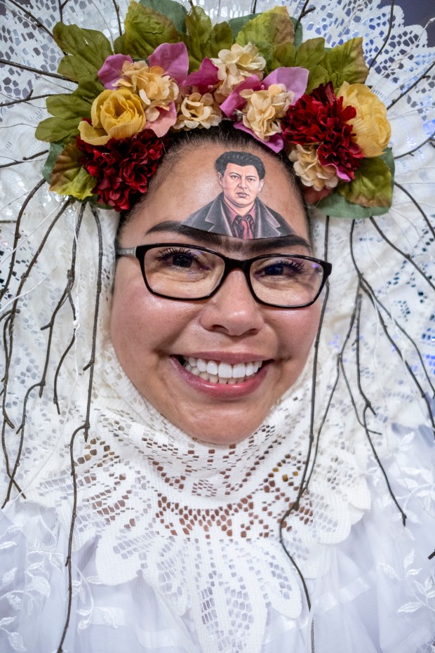 SAN ANTONIO, TEXAS - AUGUST 15: Mickie Trevino poses for a portrait as she attends a Guinness World Record attempt for the largest gathering of people dressed as Frida Kahlo during the 10th annual San Antonio Frida Fest on August 15, 2026 in San Antonio, Texas. Organizers counted 80 Kahlo look-alikes, not enough to surpass the 2017 largest recorded gathering of over 1,000 participants at the Dallas Museum of Art. (Photo by Joel Angel Juarez/Getty Images)