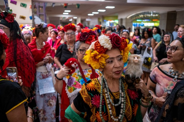 SAN ANTONIO, TEXAS - AUGUST 15: Teresa Kattengell participates in a Guinness World Record attempt for the largest gathering of people dressed as Frida Kahlo during the 10th annual San Antonio Frida Fest on August 15, 2026 in San Antonio, Texas. Organizers counted 80 Kahlo look-alikes, not enough to surpass the 2017 largest recorded gathering of over 1,000 participants at the Dallas Museum of Art. (Photo by Joel Angel Juarez/Getty Images)