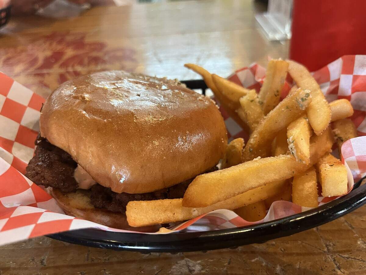 The $5 double patty smash cheeseburger at Bearded Lady is served all day Wednesdays with a side of fries.