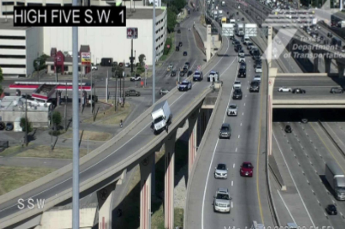 Box truck hangs over I-635 ramp, causing closure