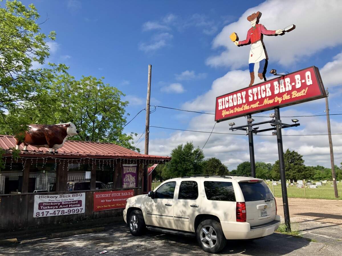 Hickory Stick Bar-B-Q in Everman, Texas, has one of the old “chuckwagon cowboy” signs from the former Underwood’s barbecue restaurants, as seen May 4, 2019.