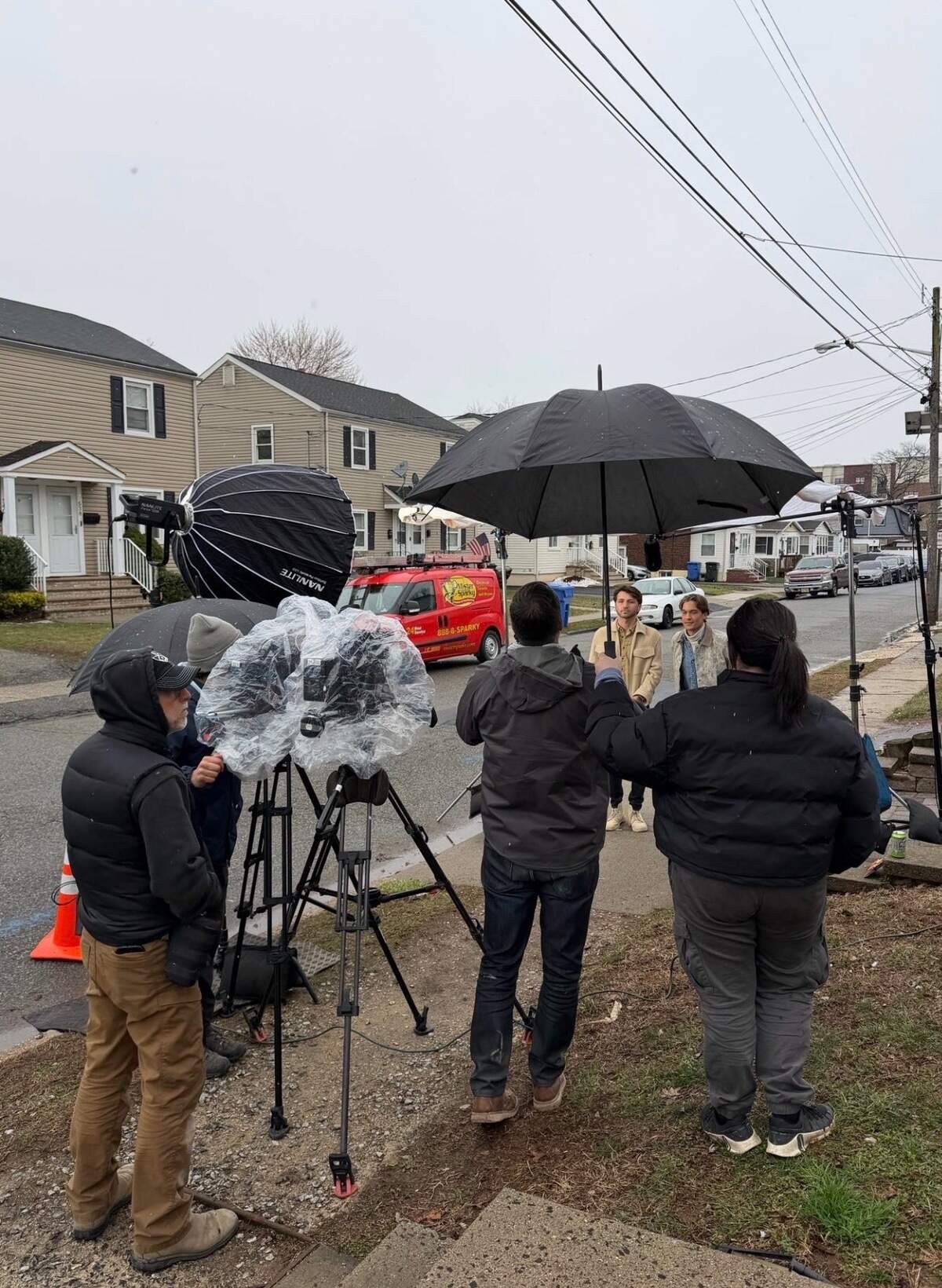 Travis Jones and Cody Crawford on set of “Honest Renovations.”