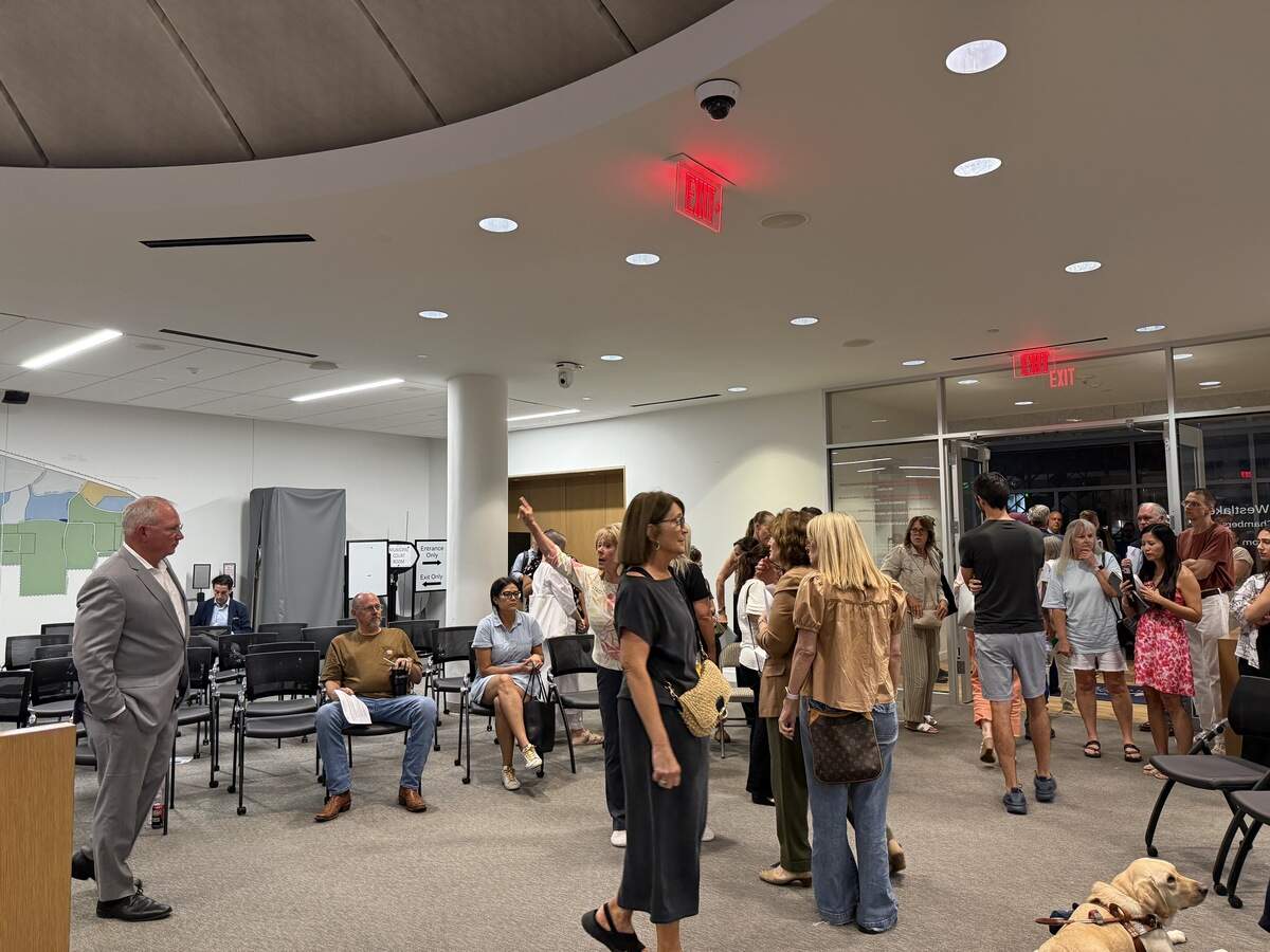 Angry Keller residents shouted at planning and zoning officials and city staff over the vote to pass the site plan.