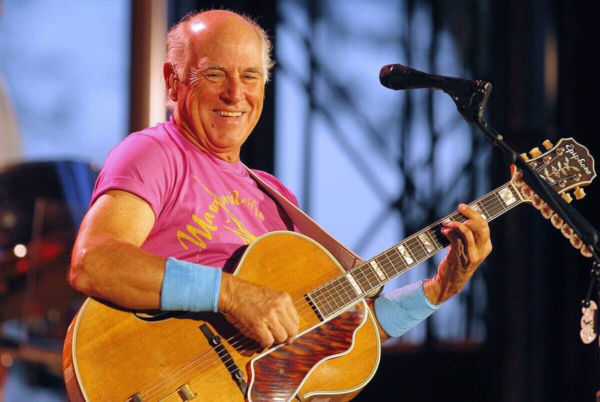 Jimmy Buffett performs at the Coyote Drive-In Thursday June 19, 2014 in Fort Worth, Texas. The event is being broadcast nationally to over 80 other drive-ins across the country. (Star-Telegram/Ron Jenkins)