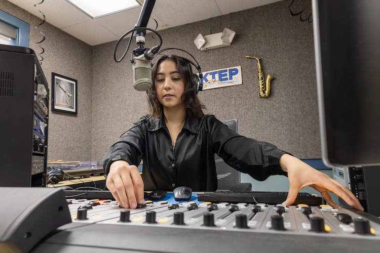 Eileen Espino, a graduate communications student at The University of Texas at El Paso, operates the soundboard during an on-air shift as a student assistant at KTEP 88.5 FM. On Aug. 13, 2026, The University of Texas System Board of Regents approved the framework for an agreement between the University and the El Paso Community Foundation to jointly manage UTEP’s public radio station.