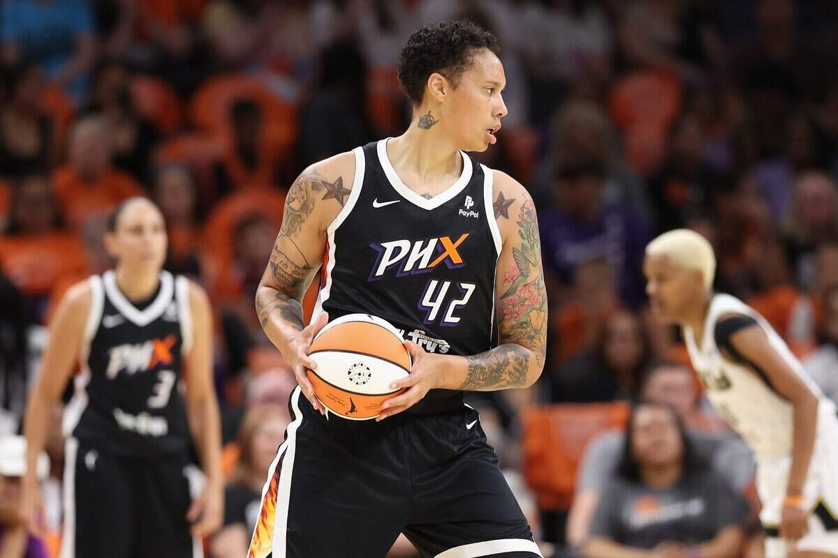 Brittney Griner (42) of the Phoenix Mercury handles the ball during the first half of the WNBA game at Footprint Center on May 21, 2023, in Phoenix. (Christian Petersen/Getty Images/TNS)