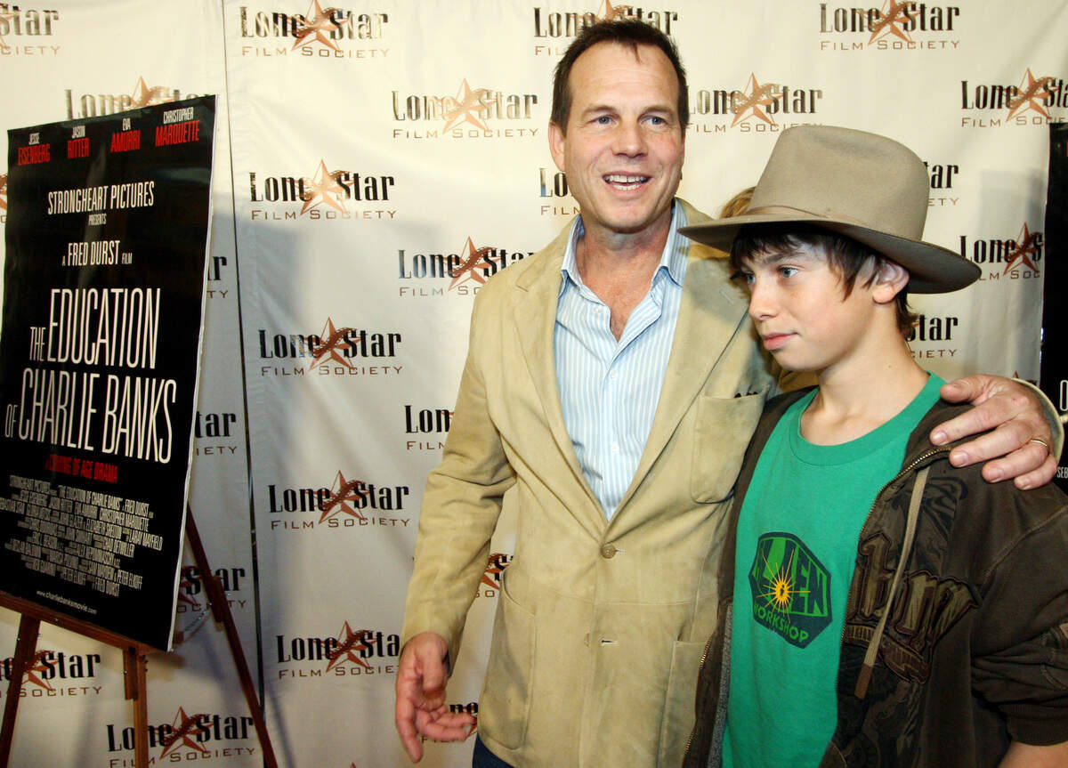 Actor Bill Paxton poses with his son James outside of the AMC Palace 9 theater in Fort Worth, Friday, Nov. 9, 2007.