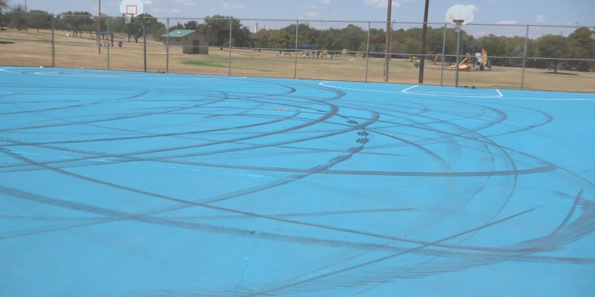 Driver covers court in tire tracks at Aztlan Park in North Lubbock