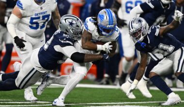 Dec 4, 2025; Detroit, Michigan, USA; Detroit Lions running back Jahmyr Gibbs (0) is tackled by Dallas Cowboys defensive tackle Quinnen Williams (92) during the first half at Ford Field.