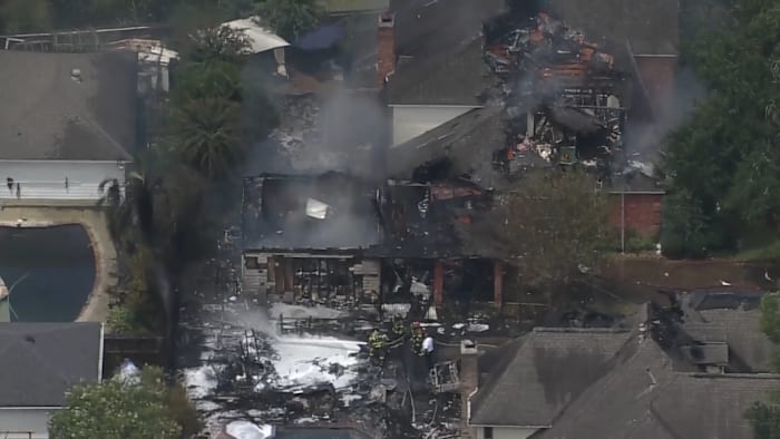 LIVE: Cy-Fair firefighters battle 2 neighboring house fires in west Houston neighborhood