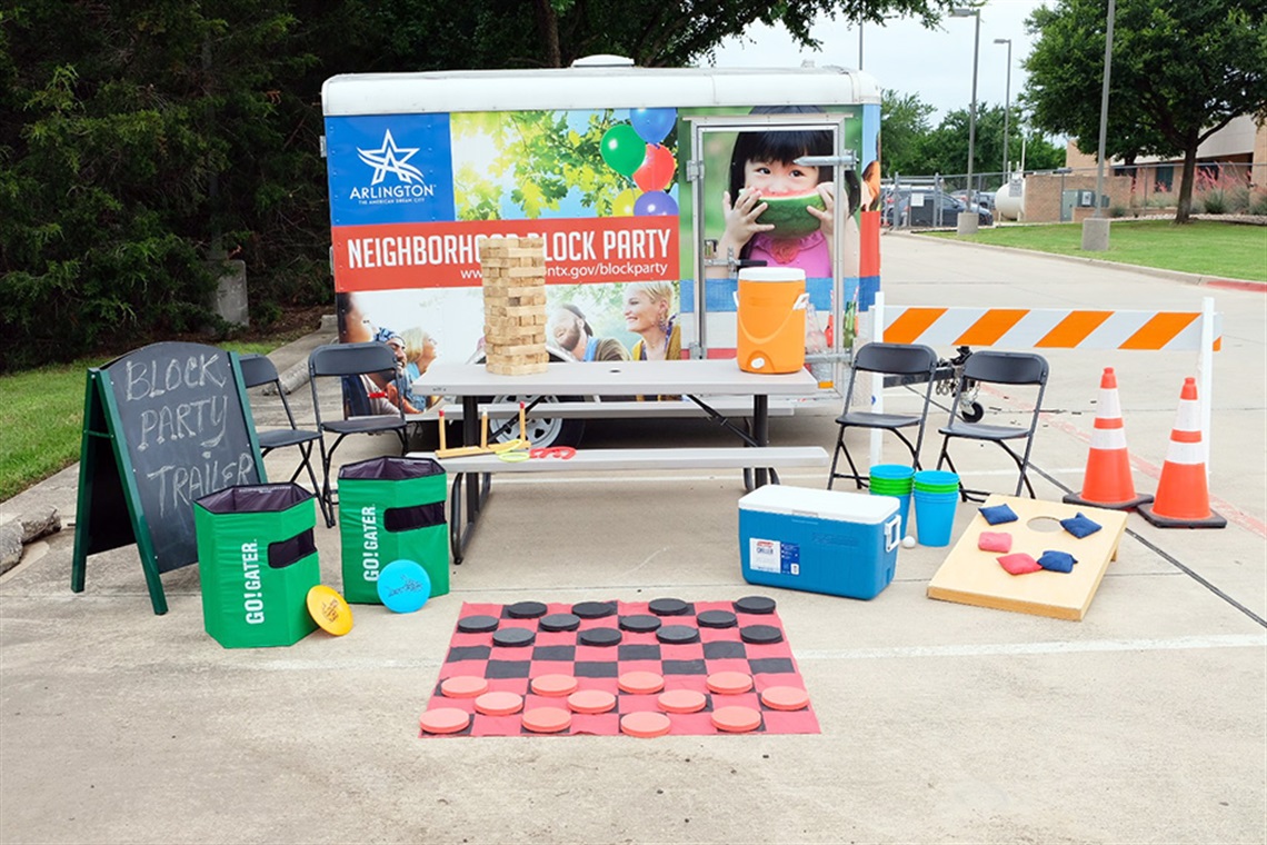 Block Party Trailer with checkboard and other games in the foreground.