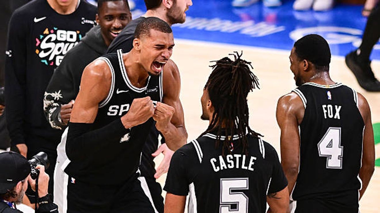 OKLAHOMA CITY, OKLAHOMA - MAY 30: Victor Wembanyama #1 of the San Antonio Spurs celebrates with Stephon Castle #5 and De'aaron Fox #4 after defeating the Oklahoma City Thunder with a score of 111 to 103 to win Game Seven of the NBA Western Conference Finals at Paycom Center on May 30, 2026 in Oklahoma City, Oklahoma. NOTE TO USER: User expressly acknowledges and agrees that, by downloading and or using this photograph, User is consenting to the terms and conditions of the Getty Images License Agreement. (Photo by Joshua Gateley/Getty Images)