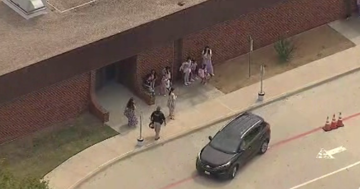 Students relocated to stadium after middle school evacuation in Carrollton