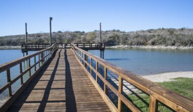 A wooden dock at a lake.