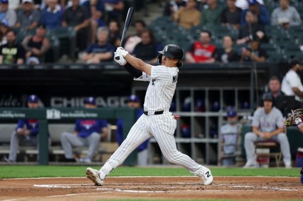 White Sox first baseman Munetaka Murakami (5) strikes out during the first inning against the Rangers at Rate Field Aug. 24, 2026 in Chicago. (Armando L. Sanchez/Chicago Tribune)