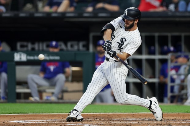 White Sox center fielder Tristan Peters (29) hits a two-run homer during the second inning against the Rangers at Rate Field Aug. 24, 2026 in Chicago. (Armando L. Sanchez/Chicago Tribune)