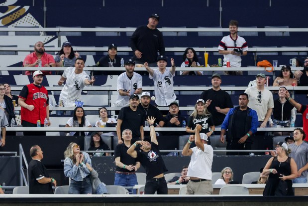 A two-run homer ball from White Sox center fielder Tristan Peters (29) falls into the stands during the second inning against the Rangers at Rate Field Aug. 24, 2026 in Chicago. (Armando L. Sanchez/Chicago Tribune)