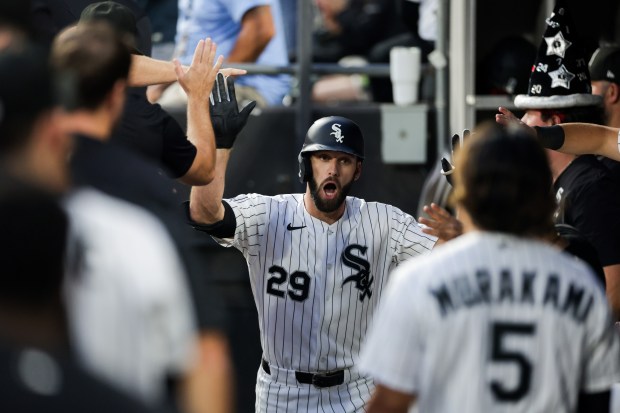 White Sox center fielder Tristan Peters (29) celibates in the dugout after hitting a two-run homer during the second inning against the Rangers at Rate Field Aug. 24, 2026 in Chicago. (Armando L. Sanchez/Chicago Tribune)