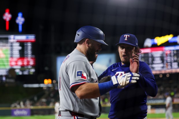 Rangers first baseman Jake Burger (21) celebrates after hitting a solo homer during the fifth inning against the White Sox at Rate Field Aug. 24, 2026 in Chicago. (Armando L. Sanchez/Chicago Tribune)