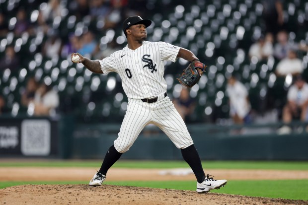White Sox shortstop Luisangel Acuña (0) pitches during the ninth inning against the Rangers at Rate Field Aug. 24, 2026 in Chicago. (Armando L. Sanchez/Chicago Tribune)