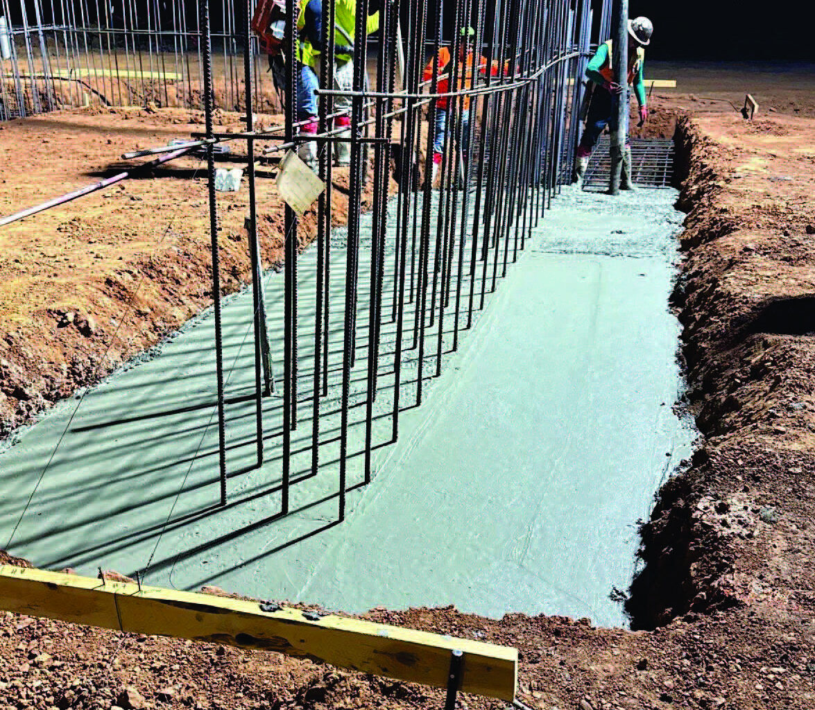 Photo provided Construction on this building at the Firehawk Aerospace site in northwest Lawton was underway at 4:45 a.m. Thursday, before the temperature soared to triple digits. A concrete foundation is being poured, and rebar has been installed to provide support for walls that will be up to 3 feet thick.