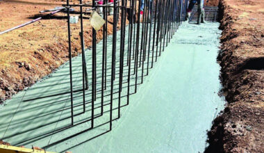 Photo provided Construction on this building at the Firehawk Aerospace site in northwest Lawton was underway at 4:45 a.m. Thursday, before the temperature soared to triple digits. A concrete foundation is being poured, and rebar has been installed to provide support for walls that will be up to 3 feet thick.