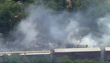 Fort Worth Fire Department battles grass fire near train tracks that spread to nearby home