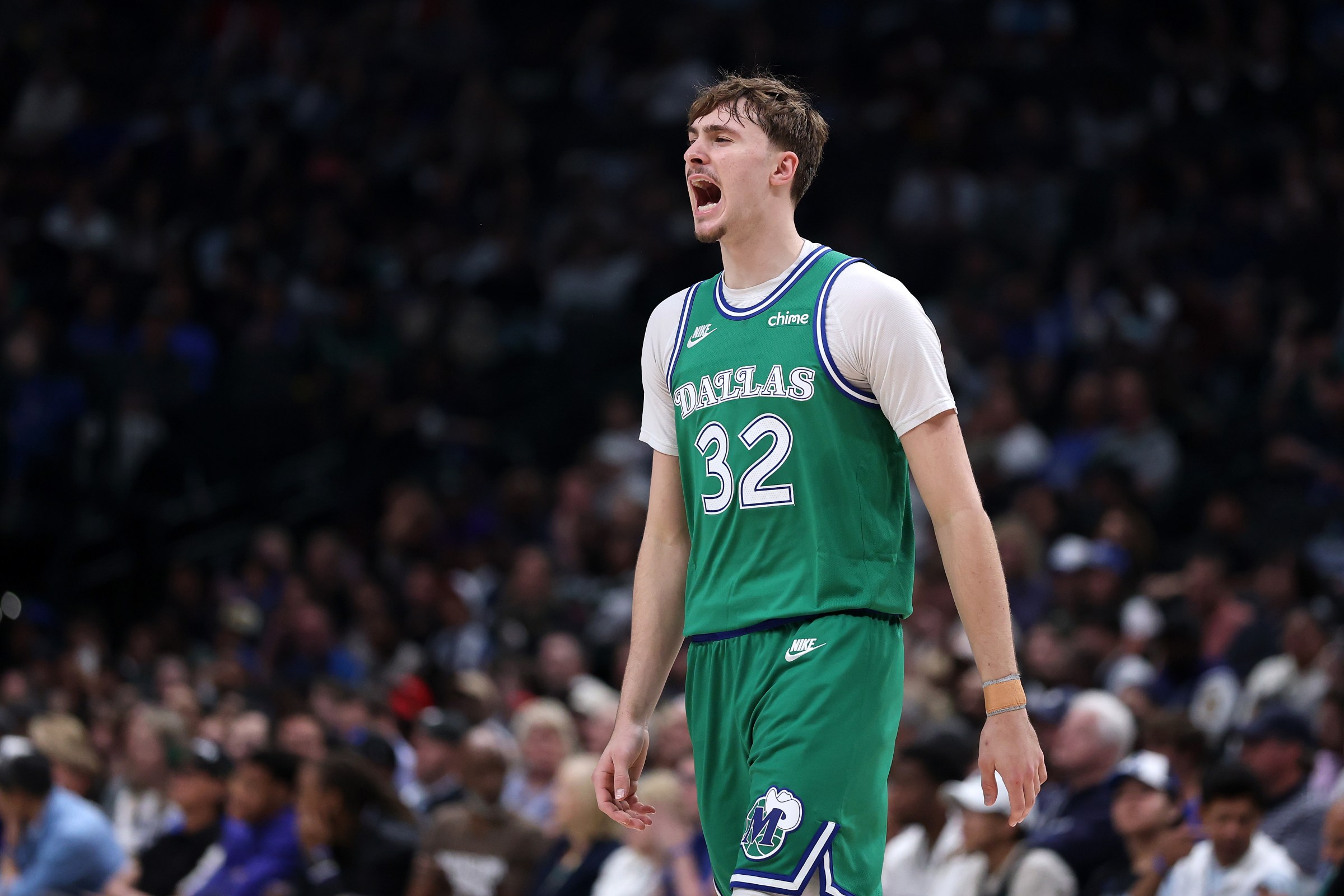 DALLAS, TEXAS - APRIL 12: Cooper Flagg #32 of the Dallas Mavericks reacts to a play during the first half against the Chicago Bulls at American Airlines Center on April 12, 2026 in Dallas, Texas. NOTE TO USER: User expressly acknowledges and agrees that, by downloading and or using this photograph, User is consenting to the terms and conditions of the GettyImages License Agreement. (Photo by Stacy Revere/Getty Images)