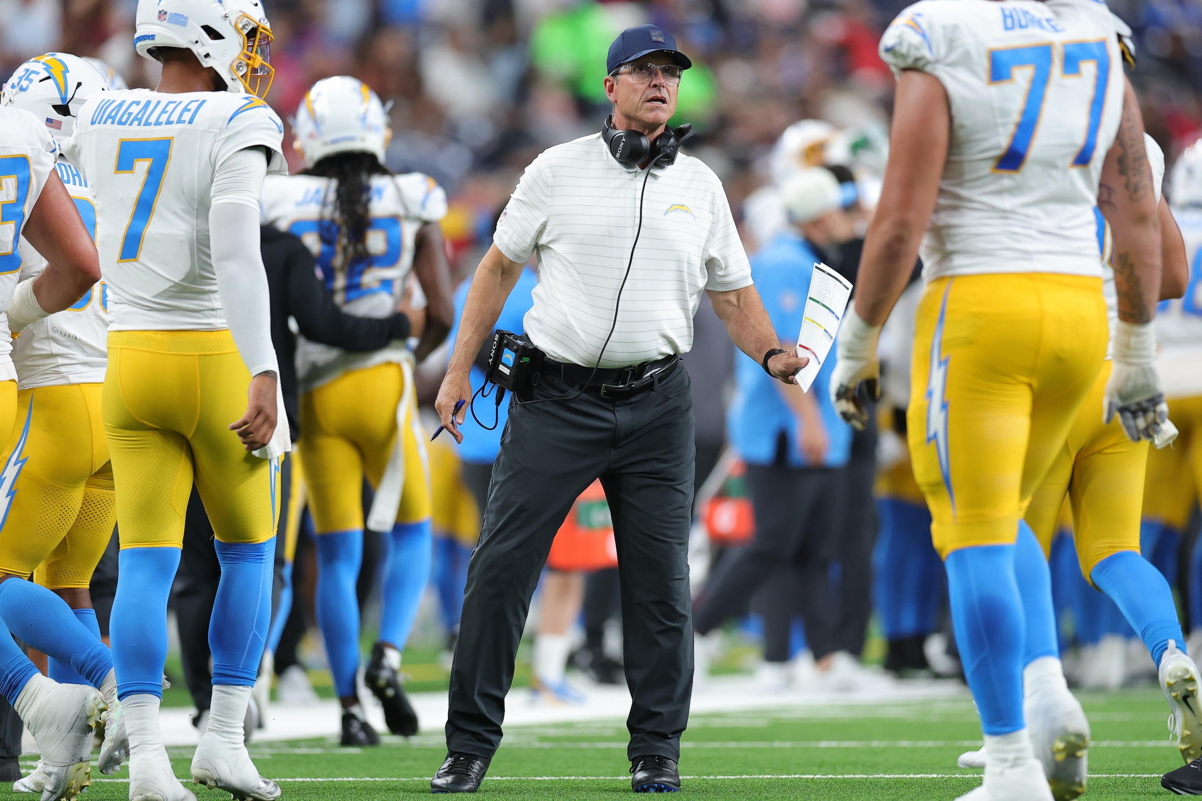 HOUSTON, TEXAS - AUGUST 13: Head coach Jim Harbaugh of the Los Angeles Chargers gives instructions during the fourth quarter of a preseason game against the Houston Texans at Reliant Stadium on August 13, 2026 in Houston, Texas. (Photo by Alex Slitz/Getty Images)