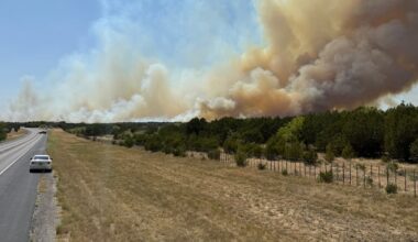 Texas wildfire forces evacuations even as Reno fire slows