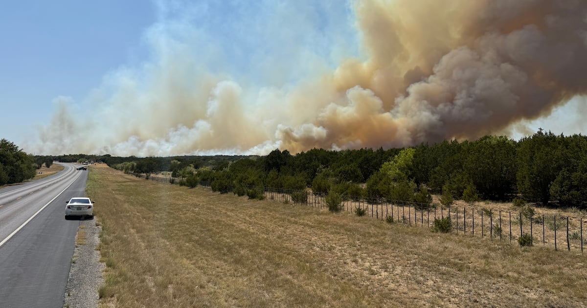 Texas wildfire forces evacuations even as Reno fire slows