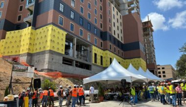 Texas State University celebrates topping out of new residence halls