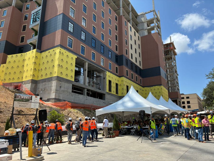 Texas State University celebrates topping out of new residence halls