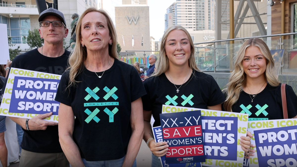 Paul and Kim Slusser on the left, women's athletes Jenna Joyce and Emma Olsen on the right.