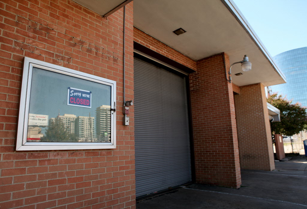 The old Dallas Fire Station No. 37 with a "Sorry we're Closed" sign out front in Dallas, Texas on Wednesday, October 23, 2013. (Brad Loper/The Dallas Morning News)