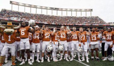 Texas players sing "The Eyes Of Texas" after defeating Kansas State 22-17 in an NCAA college football game in Austin, Texas, Friday, Nov. 26, 2021. (AP Photo/Chuck Burton)