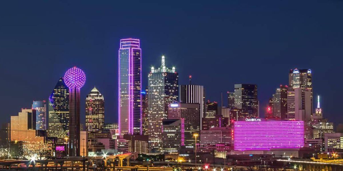 Dallas skyline turns pink as Texas mourns Dolly Parton