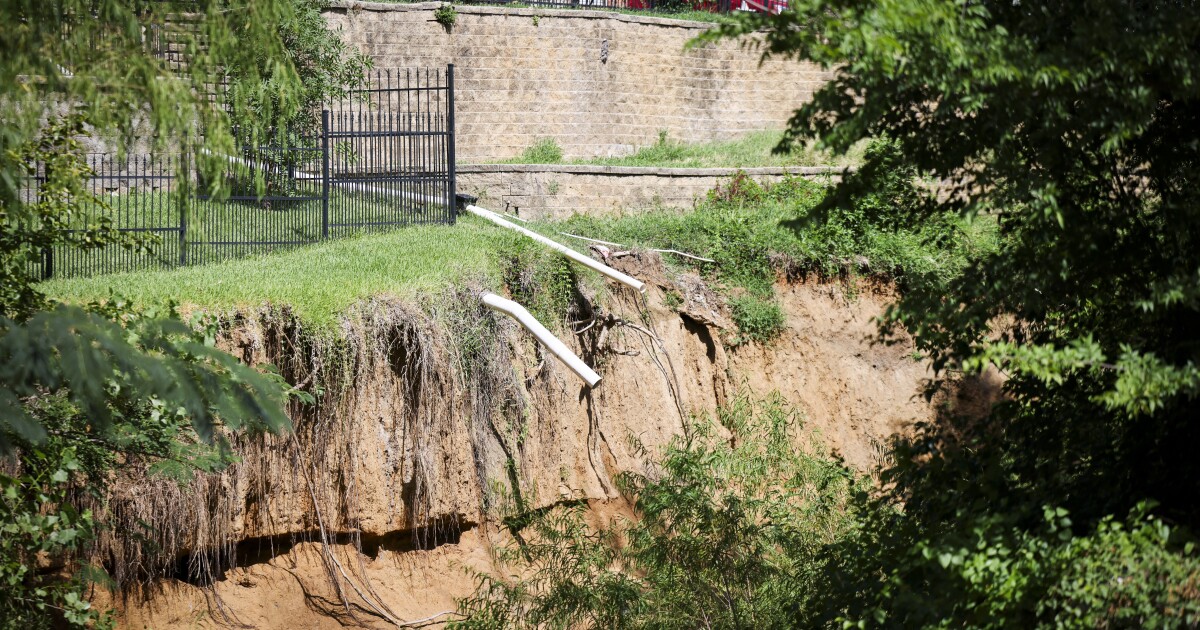 As creeks eat away at Arlington backyards, residents demand city take action to prevent crisis