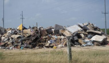 In this flood-ravaged South Texas town, residents are rebuilding while waiting for federal aid
