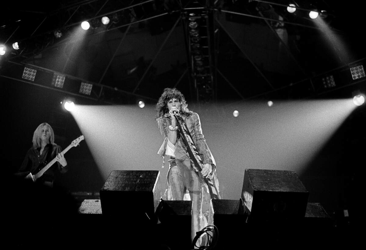 Steven Tyler, Aerosmith lead singer at right, in concert at the Tarrant County Convention Center on June 21, 1977. Pictured at left is Aerosmith bassist Tom Hamilton.