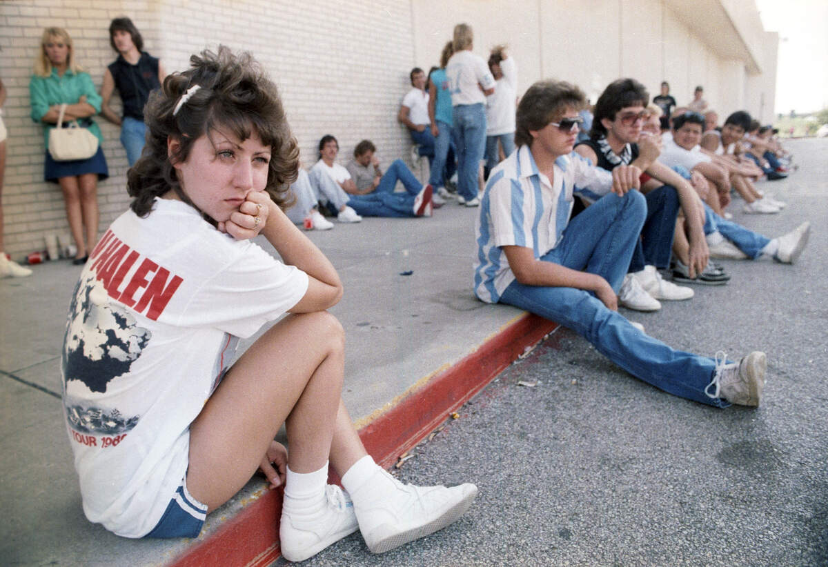 Toni Greico of Fort Worth, Texas waits in line to buy Van Halen concert tickets outside of the Tarrant County Convention Center on Sept. 18, 2986.