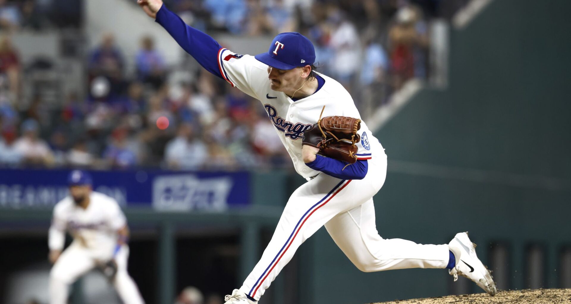 Rangers place pair of right-handed relievers on IL, recall rookie duo