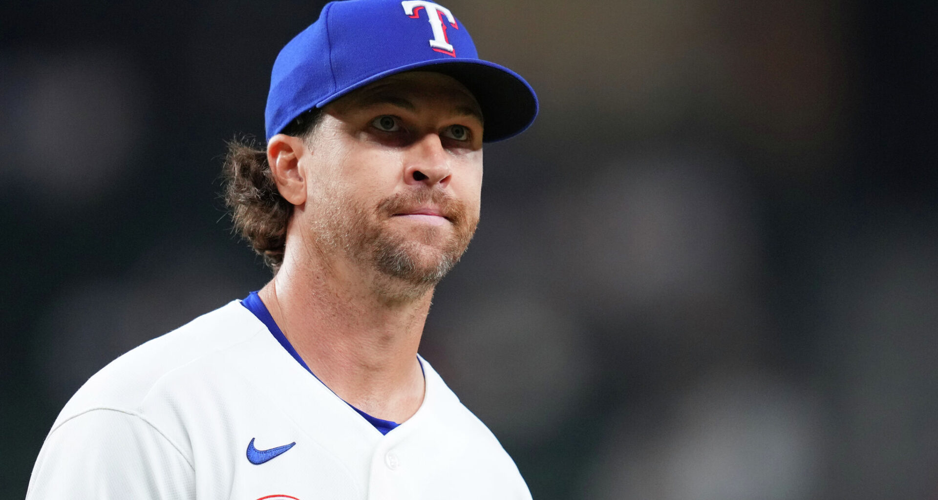 Texas Rangers pitcher Jacob Latz (67) celebrates with Texas Rangers catcher Danny Jansen (9) after their 2-0 victory against Washington Nationals at Globe Life Field, Thursday, Aug. 20, 2026, in Arlington.