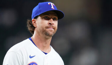 Texas Rangers pitcher Jacob Latz (67) celebrates with Texas Rangers catcher Danny Jansen (9) after their 2-0 victory against Washington Nationals at Globe Life Field, Thursday, Aug. 20, 2026, in Arlington.