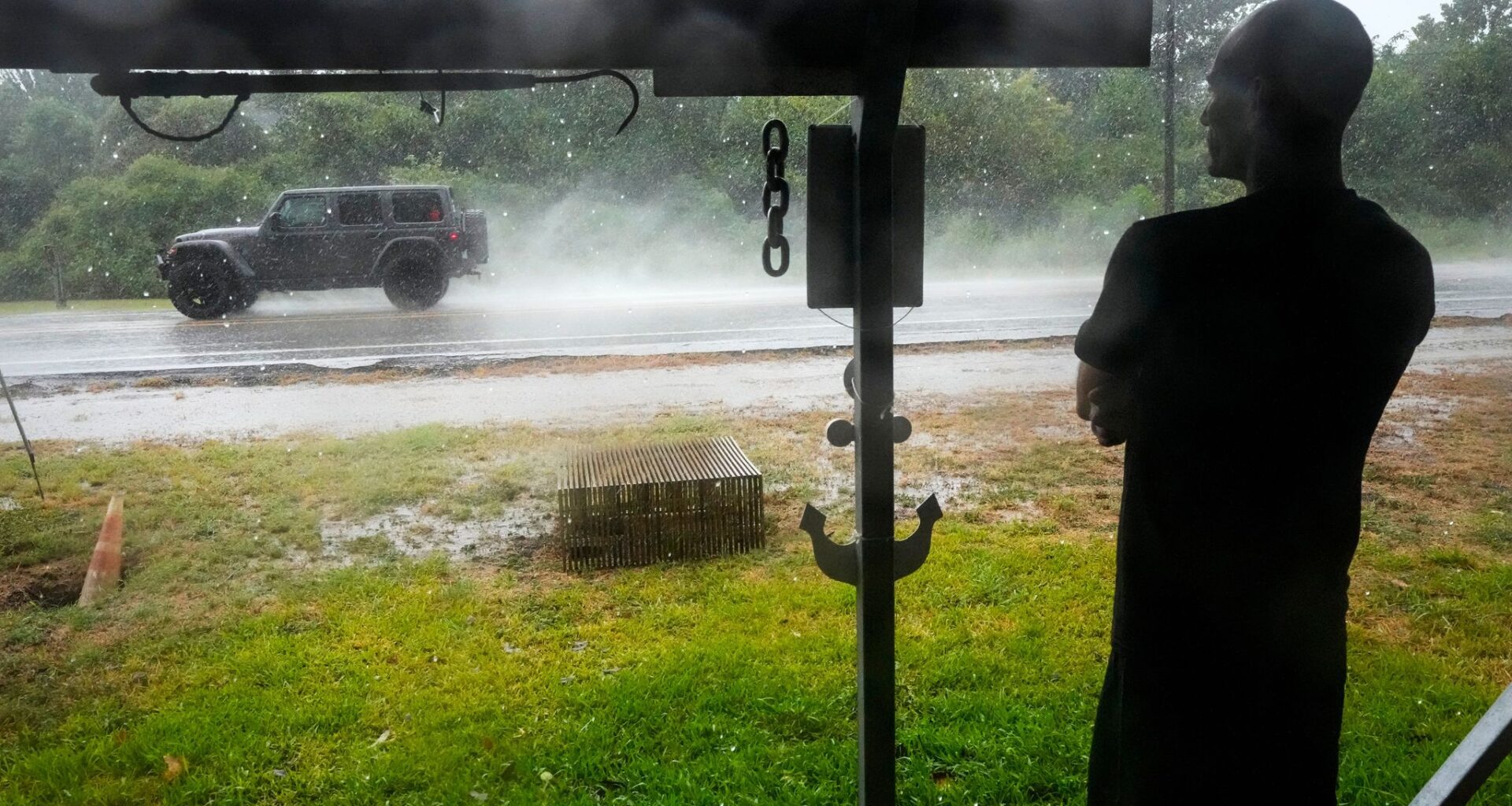 Edouard, now a tropical depression, drenches Texas with flash flooding and downed trees