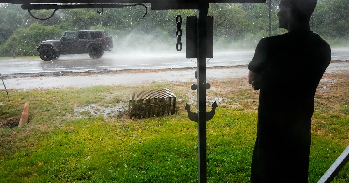 Edouard, now a tropical depression, drenches Texas with flash flooding and downed trees