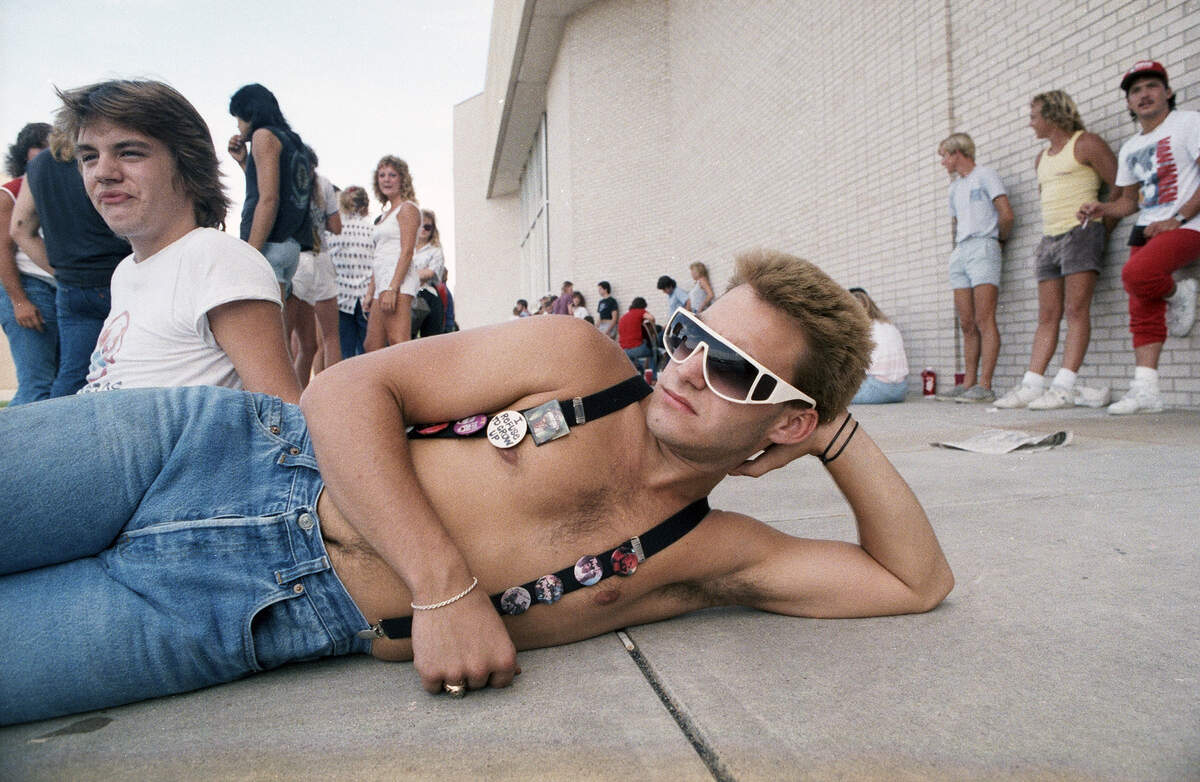 Van Halen fans wait in line to buy concert tickets outside of the Tarrant County Convention Center on Sept. 18, 1986, in Fort Worth.