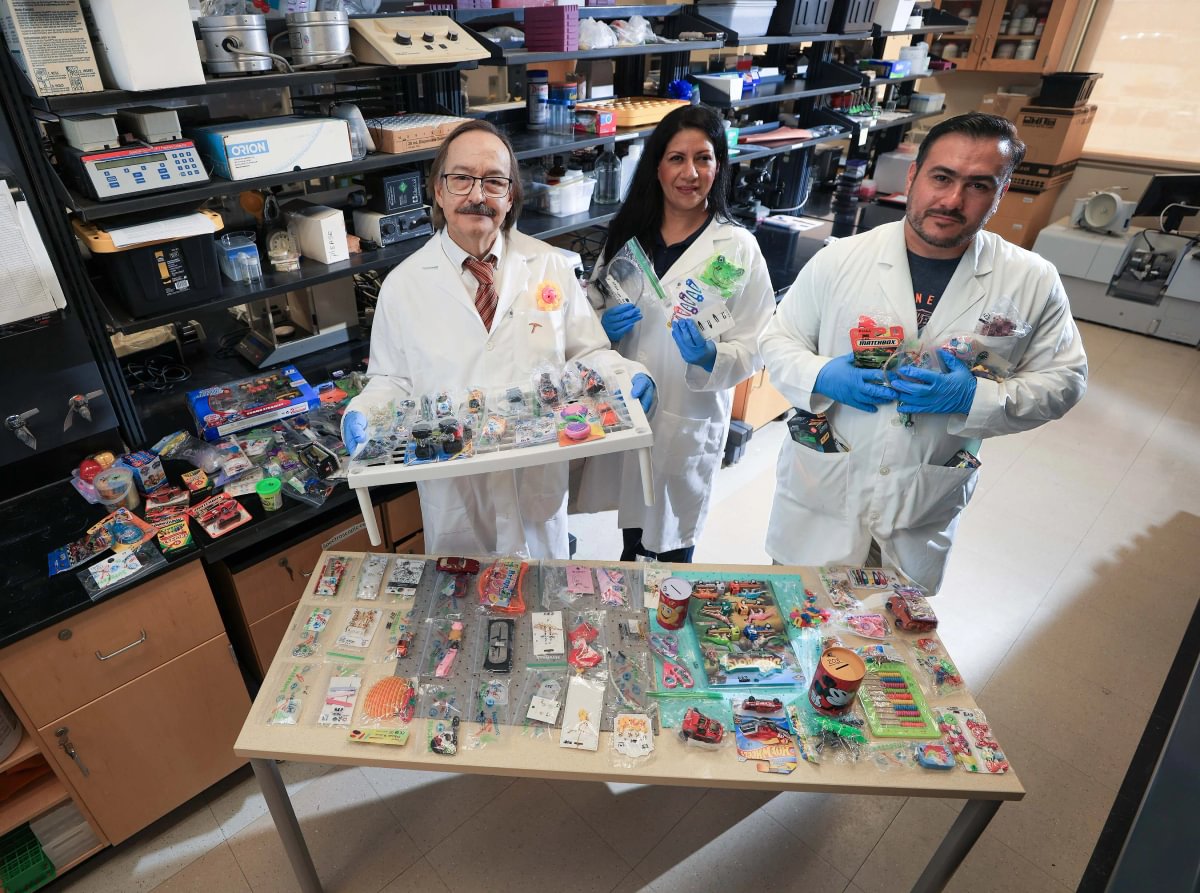 Jorge Gardea-Torresdey, Ph.D. (left), professor of chemistry and biochemistry, and doctoral students Maricarmen Lerma (center) and Abraham Dagda-Torres (right), all from the College of Science, are coauthors of a study that used X-ray fluorescence spectroscopy to find that nearly four out of five children’s toys purchased in the El Paso-Ciudad Juárez region contain at least one toxic element. The research was published in the journal Environmental Pollution.